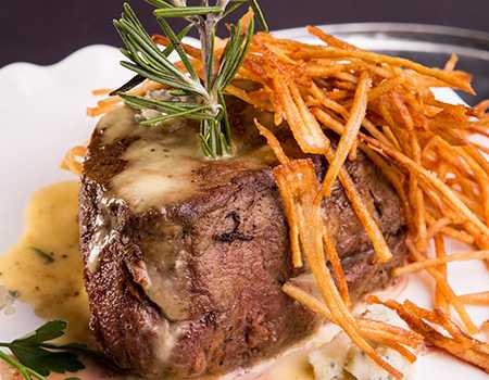 Tenderloin Steaks with Blue Cheese Sauce and Rosemary Potato Sticks