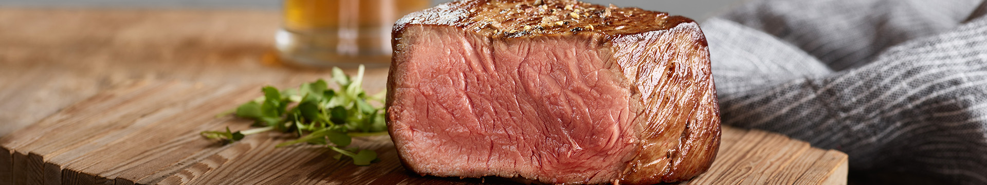 Cooked Signature Cut Strip Steak